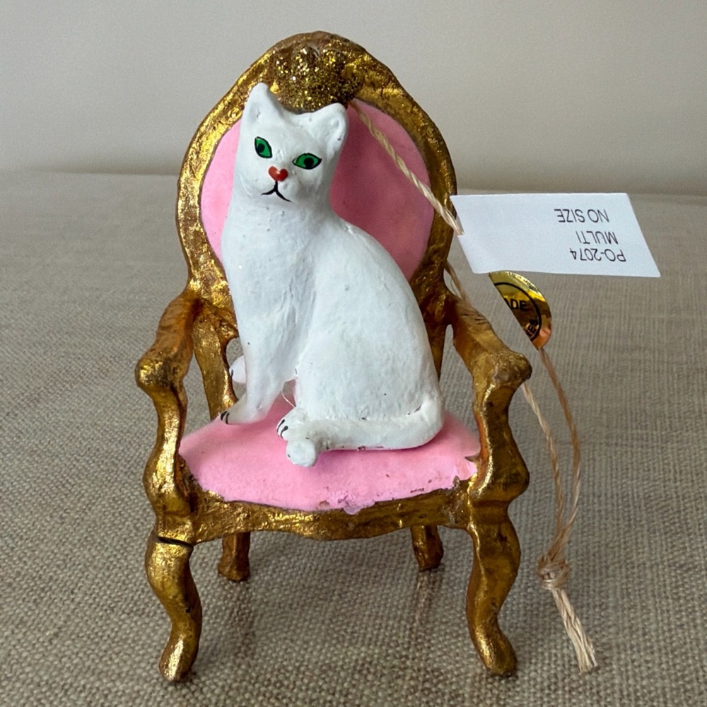 Elegant White Cat Figurine on Gold Chair